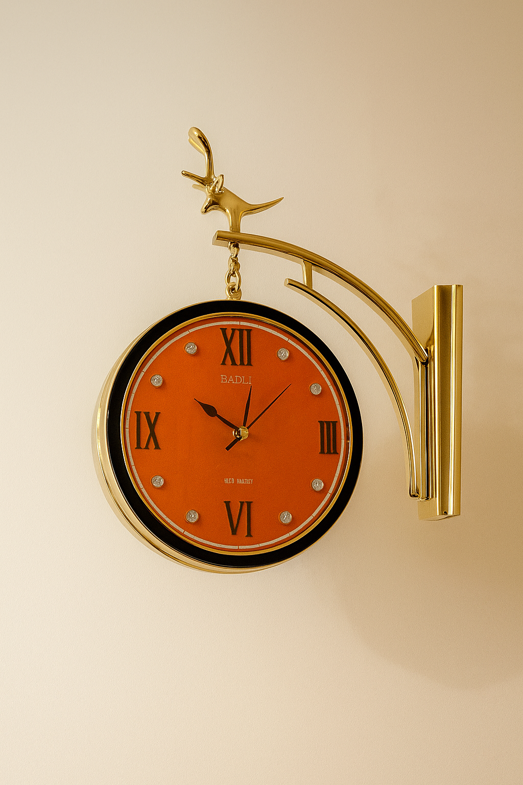 Golden Hanging Wall Clock with Orange Roman Dial – BADLI Design